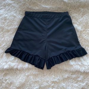Pretty Little Thing Black Flare Shorts